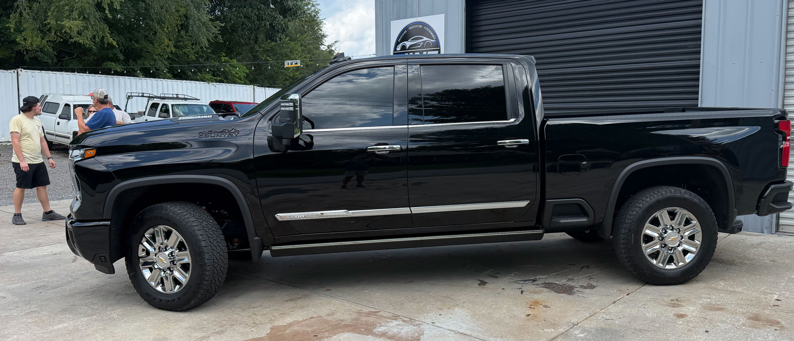Black pickup truck with full window tint