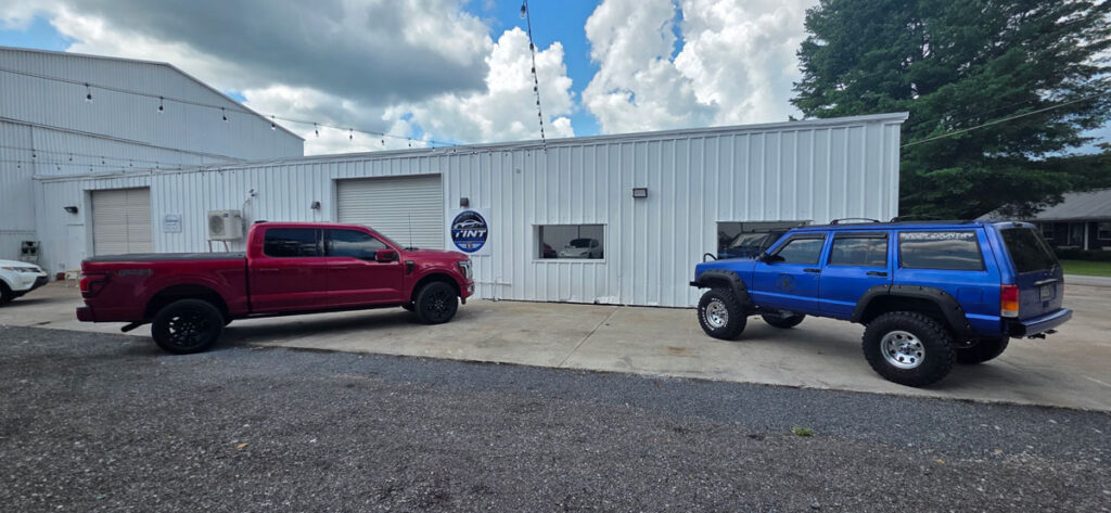 Vehicles outside the Tint Chattanooga studio