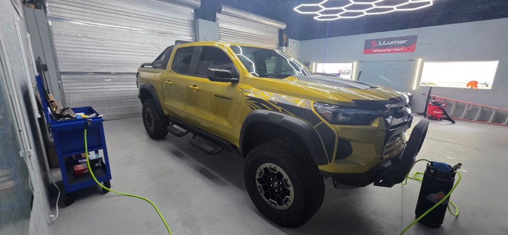 Gold off-road truck with window tint