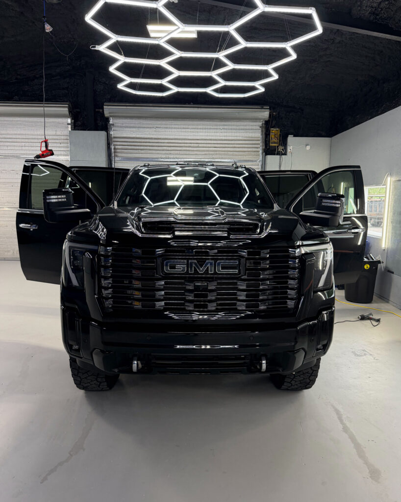 Black truck front in the studio