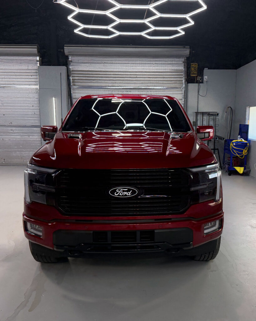 Red truck front in the studio