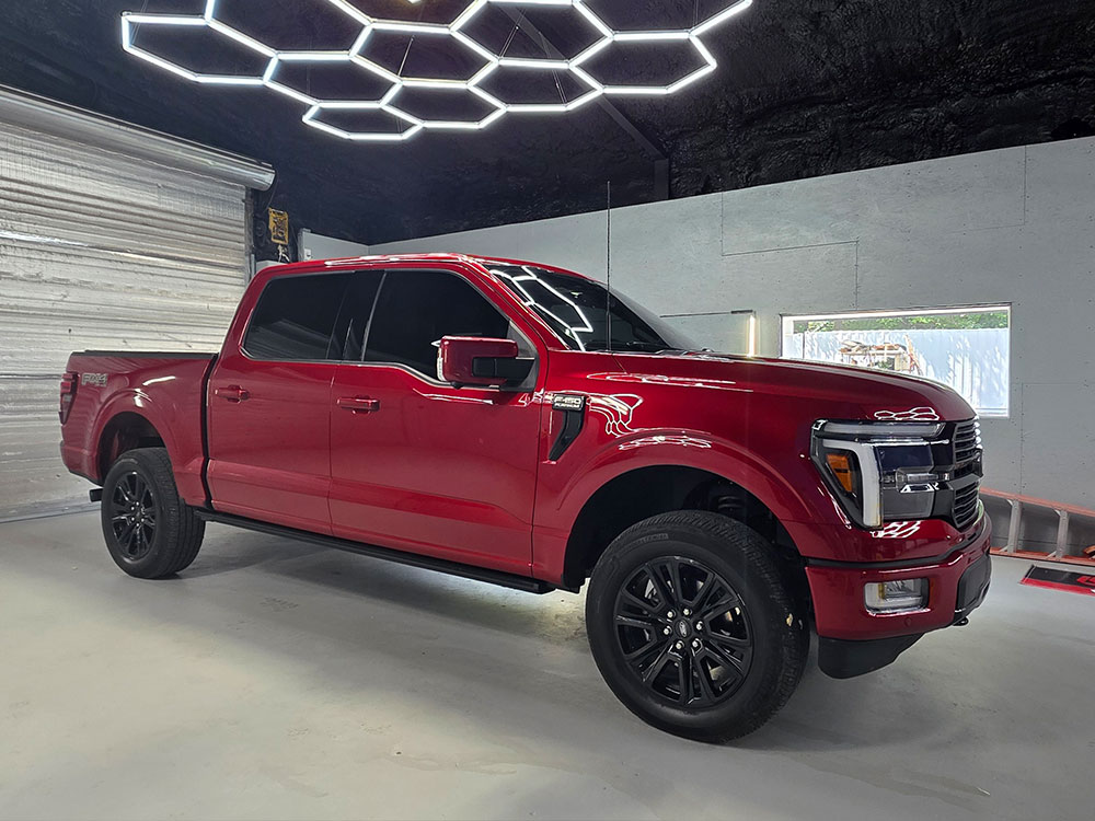 Red truck with window tint