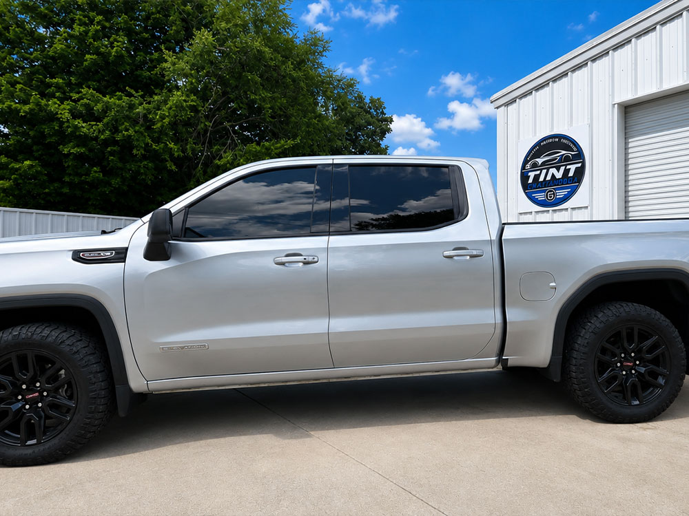 Silver pickup truck with window tint