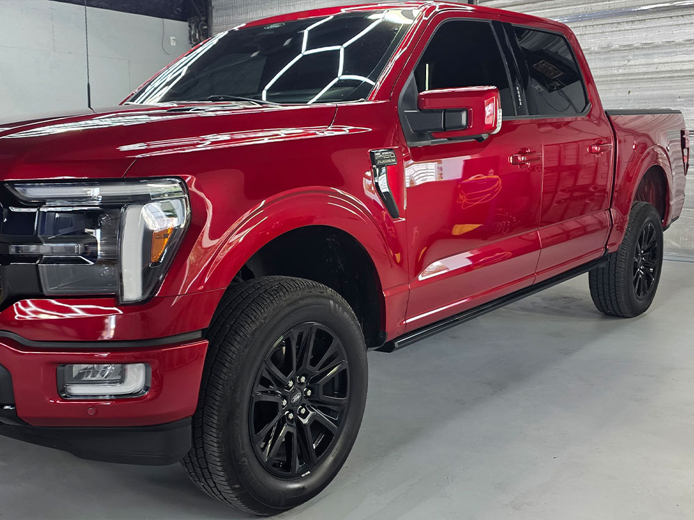 Red truck with tinted windows